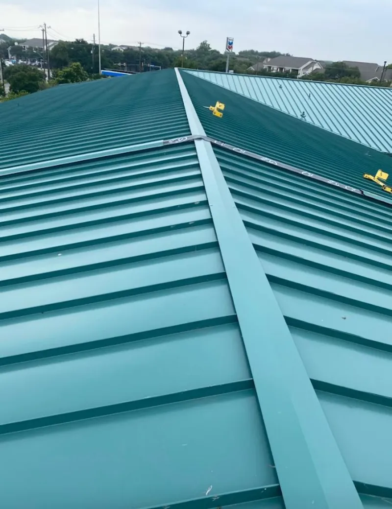 Green commercial metal roof ridge and valley for Metal Roof Repair in Socorro